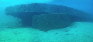 USS <em>Monitor</em> wreck site. Turret lies upside down under the ship's hull. Courtesy <em>Monitor</em> Collection, NOAA