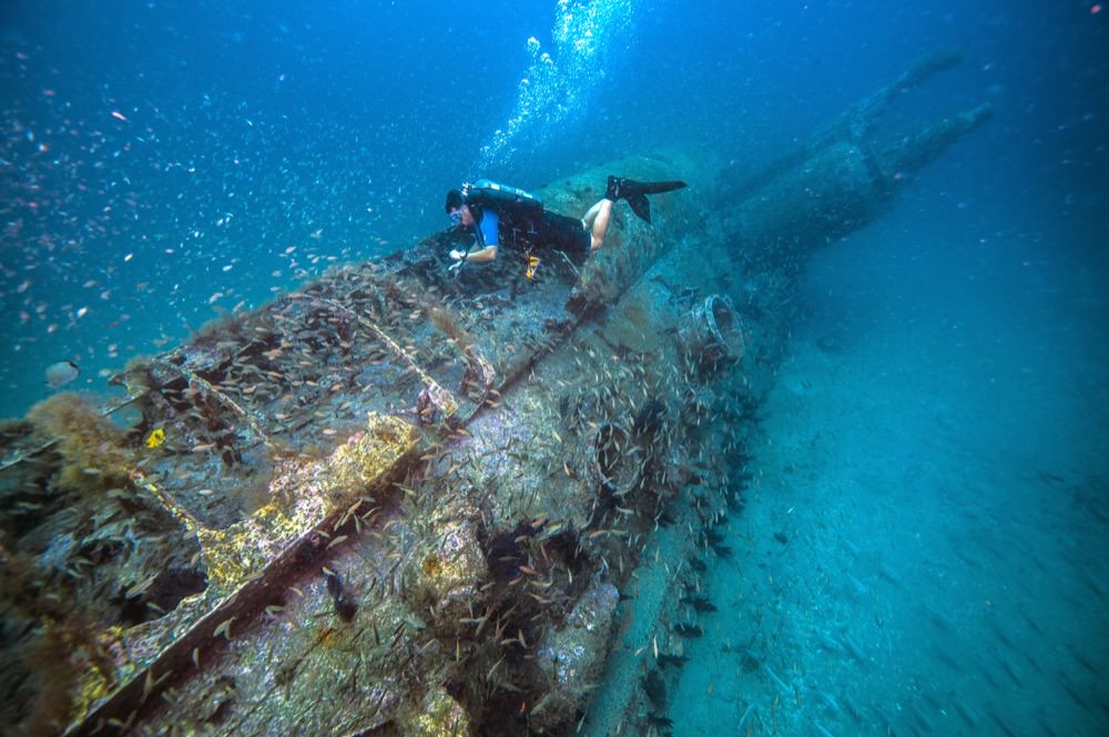 NOAA diver surveys the German U-boat, U-352.