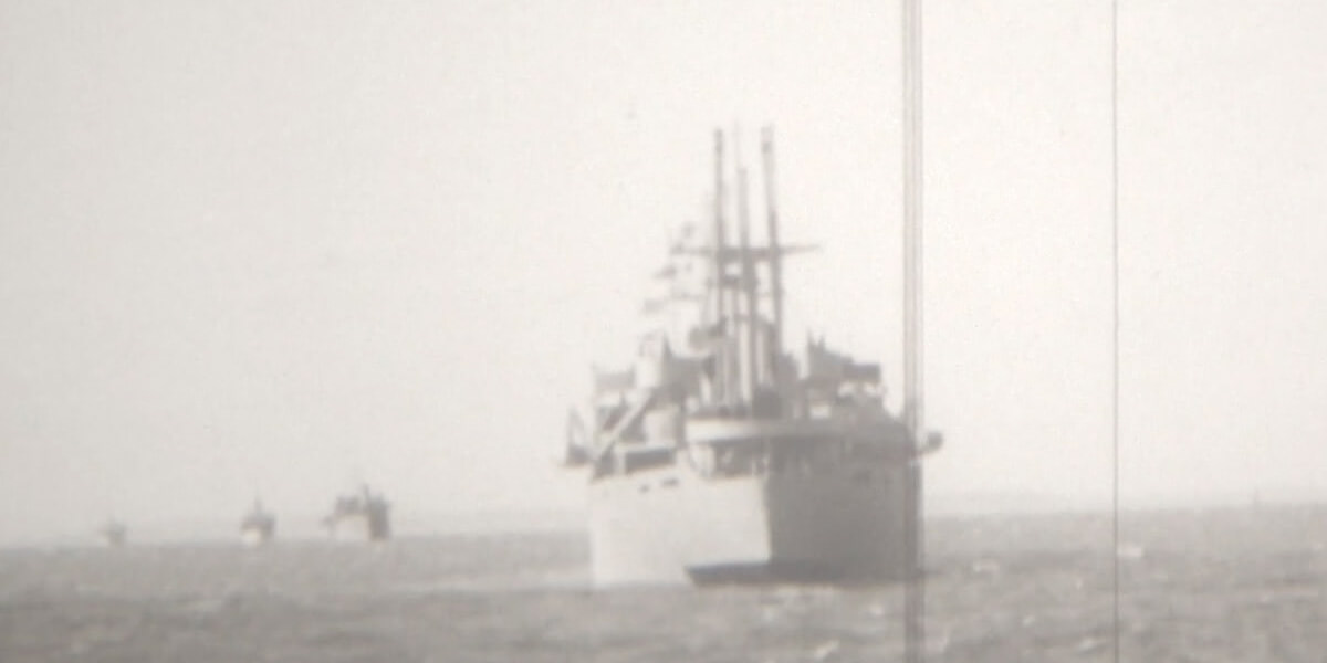 Black and white photo of world war II era ship