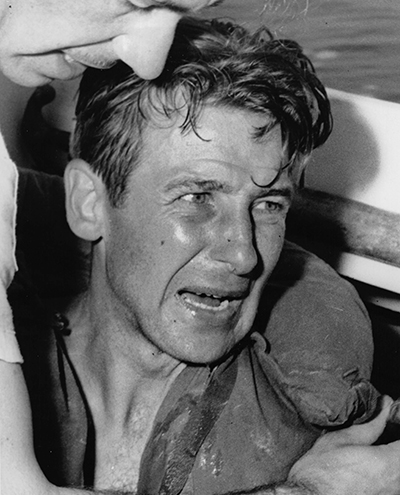 A distressed survivor of the Jackson wreck after being rescued