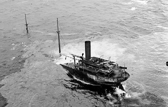 The damaged and sinking tanker F.W. Abrams